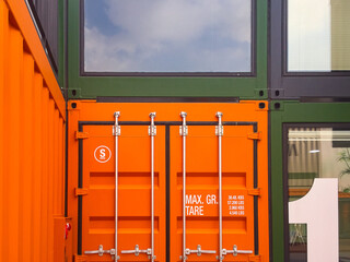 Buildings constructed by combining modular shipping containers, repurposed into cultural spaces,...