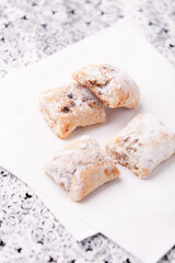 Stollen Bites on bright background. Soft focus. Close up.