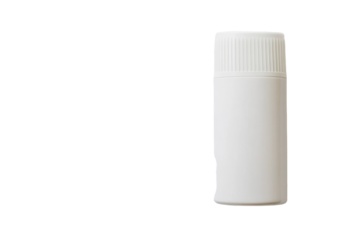 Simple white container resting on a smooth surface illuminated by soft natural light
