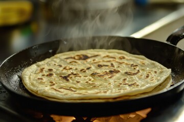 Freshly cooked roti on a hot skillet with rising steam indian kitchen food photography culinary environment close-up view delicious concept