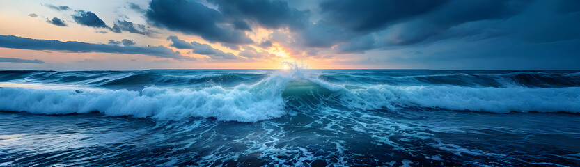Fototapeta premium Large ocean waves break at sunset. A vibrant sky with dark clouds contrasts with the turquoise and white of the churning water. Dramatic and powerful scene.