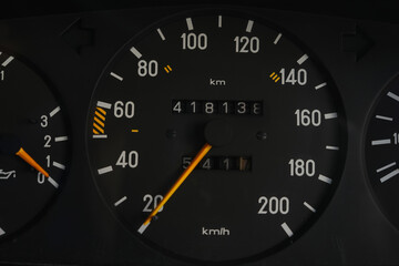 Analog speedometer in an internal combustion engine car at an auto show in Bangkok, Thailand, photographed on December 8, 2014.