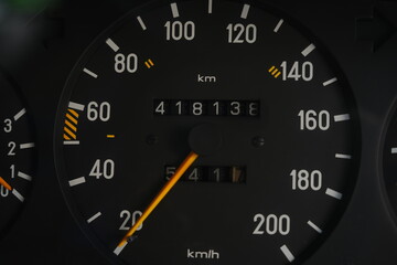 Analog speedometer in an internal combustion engine car at an auto show in Bangkok, Thailand, photographed on December 8, 2014.