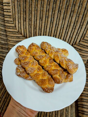 homemade vanilla cookies in the form of pigtails.