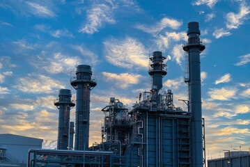 Oil refinery industry at sunset - factory - petrochemical plant