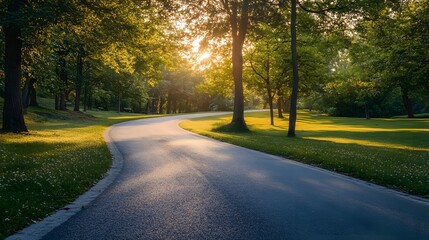 Obraz premium Road leading toward a sunrise with soft light illuminating the path symbolizing a hopeful new beginning