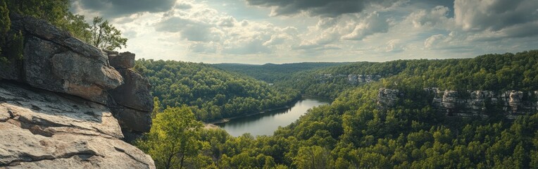 A breathtaking panoramic view of the lush Ha Ha Valley showcasing the serene river and vibrant greenery under a cloudy sky