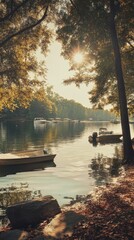 Obraz premium Tranquil waters of Lake at sunrise with boats resting by the shore and trees reflecting in the calm surface