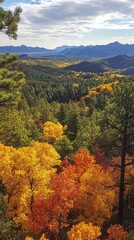Fototapeta premium Breathtaking autumn colors in the Los Alamos forest showcasing vibrant foliage and serene mountains