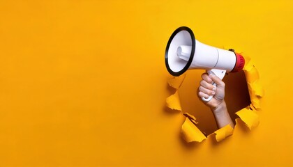 Hiring Announcement Hand with Megaphone Emerging from Hole in the Wall on Yellow