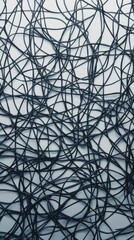 Abstract Composition of Intertwined Dark Lines Creating a Complex and Entangled Texture on a Light Background for Modern Design and Artistic Projects