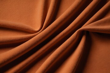 Obraz premium a close up of a plain orange fabric with a very thin design