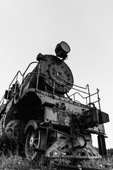 Front carriage of a locomotive in black and white photography