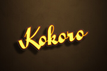 Yellow Neon Light Text Effect of Japanese name Kokoro on Golden background.
