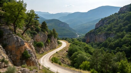 Winding rural road through mountains,
