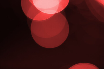 Abstract blurred red bokeh lights background