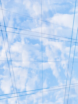 Full frame shot of glass building with reflection of clouds