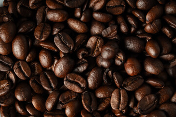 White cup with coffee beans
