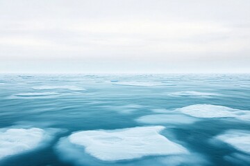 Fototapeta premium Tranquil Arctic Seascape Features Ice Floes with Smooth Blue Water Undersoft Cloudy Skies, Evoking Serenity and Natural Beauty in Polar Regions