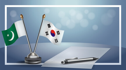 Pakistan and South Korea National flags on small table with bokeh background, cooperative relationship