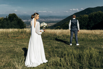 couple against the backdrop of a picturesque landscape