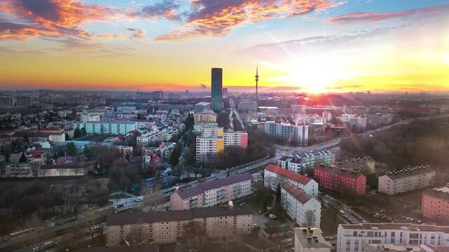 Munich aerial skyline top view fly over city centr in front munich tv tower skyscrapers buldings at sunrise.