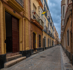 The charming narrow streets and alleys of El Pópulo neighborhood of the old town of Cadiz, Andalusia (Andalucía), Spain
