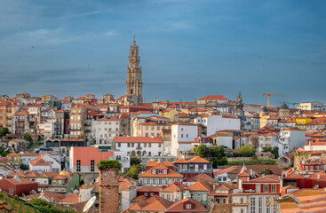 The skyline of the old town of Porto with the bell tower of dos Clerigos church prominent in the...