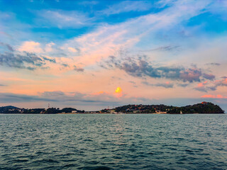 Sunset at CAPE PANWA PHUKET Thailand from sea