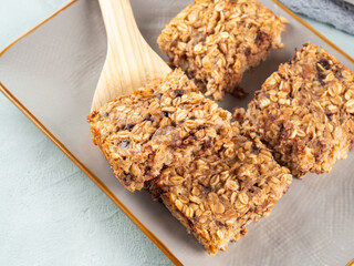 Baked oatmeal peanut butter banana cake bars with chocolate chips
