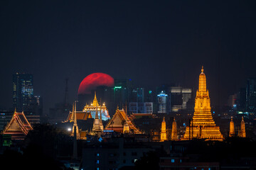 Big Moon with Golden Mount Bangkok and Thonburi Pagoda of Wat Arun.
