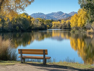 A quiet spot by the lake with a bench, calm water reflecting the surrounding trees and mountains, creating a serene environment.