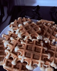 Home made waffles  in black plate 