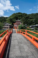 Kusado Inari Shrine at the end of the round vermilion bridge