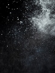 Obraz premium White powder explosion on black background.