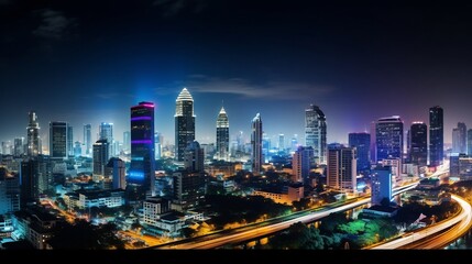 Fototapeta premium Mesmerizing panoramic view of Bangkok s bustling nighttime skyline featuring a stunning array of modern skyscrapers and high rise buildings illuminated against the dark sky