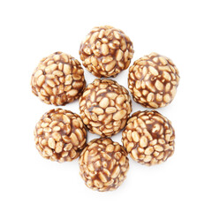 Delicious chocolate puffed rice balls isolated on white, top view