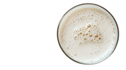 A Refreshing Glass of Milk with Bubbles on a White Surface - Perfect for Food and Beverage Themes in Advertising or Editorial Use.