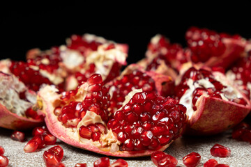 Close-up of pomegranate seeds, an open fruit, the benefits of pomegranates.