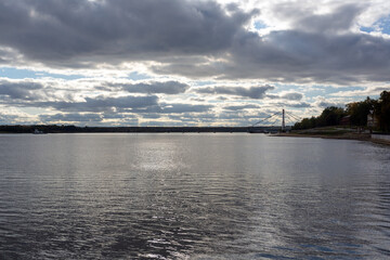 Cityscape, Sheksna river, Oktyabrsky bridge in the distance, Cherepovets, Vologda region, Russia