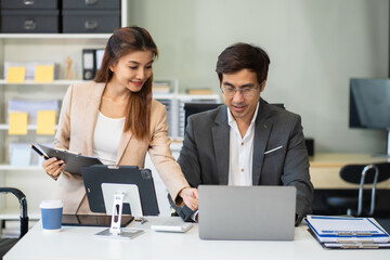 Happy smiling businessman feel happy work complete Teamwork success, success at work in the office concept.