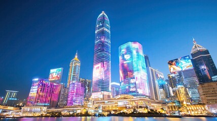 Fototapeta premium Futuristic city skyline glowing with neon lights, showcasing futuristic city skyline architecture under a clear night sky, featuring a vibrant and colorful futuristic city skyline view