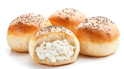 Fresh baked cottage cheese buns on white background showcasing golden crust and poppy seeds, perfect for breakfast or desserts.