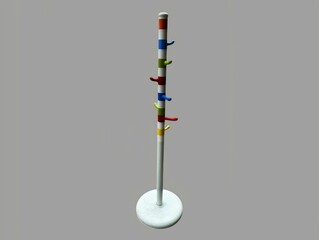 The picture shows a multi-purpose hanger with a base and a place to hang things. It is made of colorful wood and can be used as a decoration in the home or for sale.