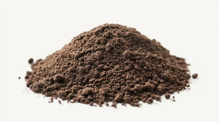 Dark brown soil pile isolated on white background showcasing texture and earthy color for gardening and agricultural themes