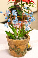 Original flowers made of polymer clay. The most realistic display. Soft focus. Close-up.