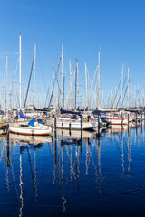 Fototapeta premium Marina with sailing boats yachts portrait format at the Baltic Sea in Heiligenhafen, Germany