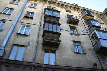 Architecture of old Soviet Union houses in Stalin's Empire style. Exterior of the facade of a...