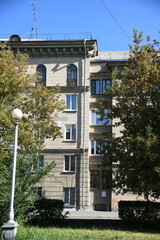 Architecture of old Soviet Union houses in Stalin's Empire style. Exterior of the facade of a...