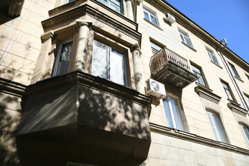 Architecture of old Soviet Union houses in Stalin's Empire style. Exterior of the facade of a...